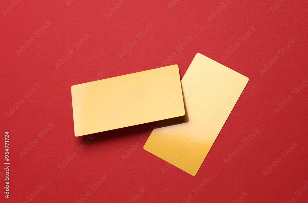 Gold business cards on red background. Gold business cards on red background.