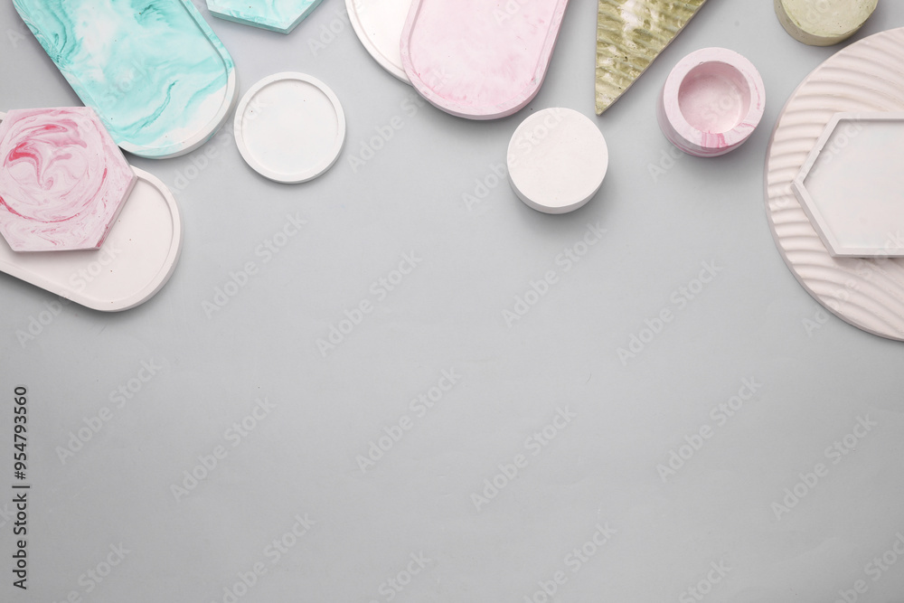 Plaster geometric shapes, trays on a gray background Plaster geometric shapes, trays on a gray background
