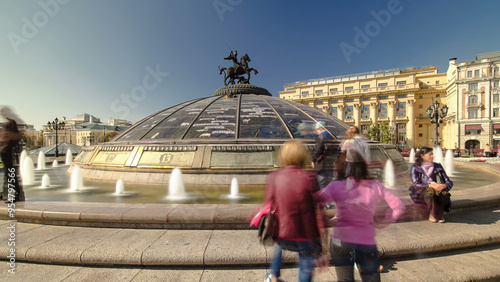 Glass cupola crowned by a statue of Saint George at the Manege Square timelapse hyperlapse in Moscow, Russia photo