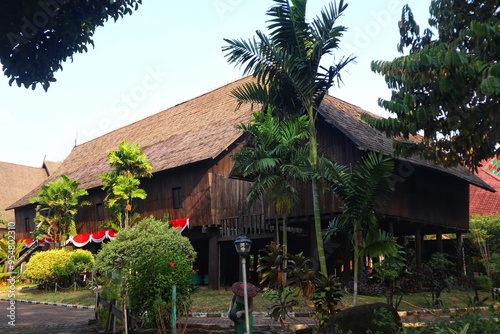 The Central Kalimantan Dayak tribe's house, called the Betang house, is made entirely of wood from the pillars to the roof. photo