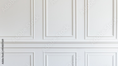 Elegant white interior wall paneling with classic rectangular patterns, providing a smooth and sophisticated backdrop for any space.