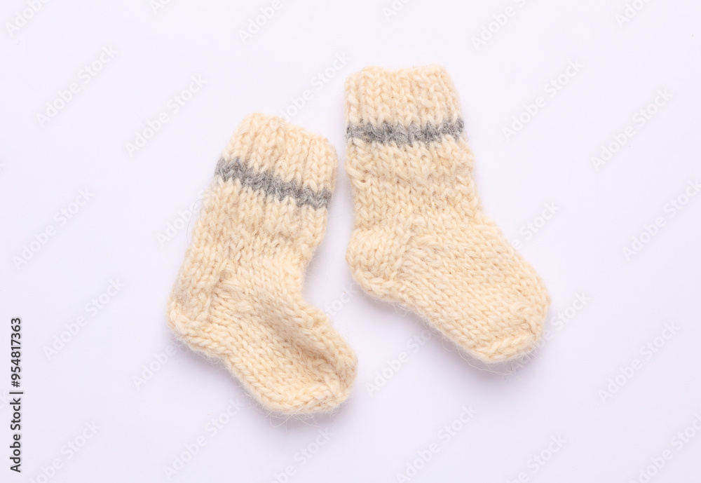Children's woolen knitted socks on a white background Children's woolen knitted socks on a white background