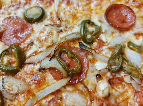 Hot Italian Pizza, Ham Pizza with Green Jalapeno Pepper and Onion, Chili Pepper and Mozzarella Cheese photo