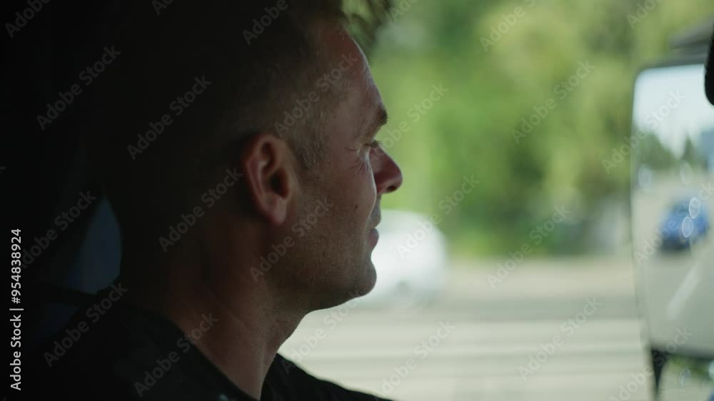 Truck Driver's Perspective: Close-Up of a Man Driving a Cargo Truck, Monitoring Traffic, and Handling the Rigors of Long-Haul Freight Transport. High quality 4k footage Truck Driver's Perspective: Close-Up of a Man Driving a Cargo Truck, Monitoring Traffic, and Handling the Rigors of Long-Haul Freight Transport. High quality 4k footage
