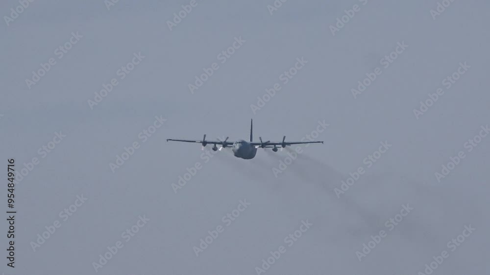 close-up view military transport airplane executing flypast near dutch airfield, imposing size aviation airspace military aviation europe close-up flyby air force defense aerial powerful close-up view military transport airplane executing flypast near dutch airfield, imposing size aviation airspace military aviation europe close-up flyby air force defense aerial powerful