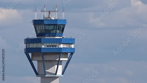 close-up aerial view left side airport control tower intricate design architecture control tower, importance airport operations close-up tower design aviation control center airport structure