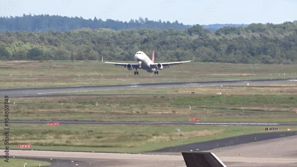dynamic airplane performing go-around maneuver international airport ...