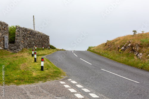 South Uist road following along the coastline on the way to Eriskay photo