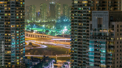 Photography Golf field timelapse from top at night time with traffic on sheikh zayed road