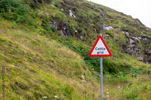 Cattle grid sign in Eriskay, Image shows the warning triangle on a remote Scottish island photo