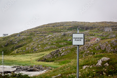 Passing place sign along the Eriskay coastline, Image shows a point allowing cars to pass due to the narrow roads of the remote Scottish island
