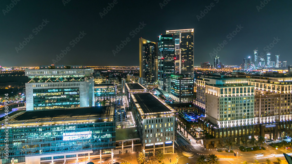 Dubai downtown architecture at night timelapse. Aerial view of numerous skyscrapers near Sheikh Zayed road. Dubai downtown architecture at night timelapse. Aerial view of numerous skyscrapers near Sheikh Zayed road.