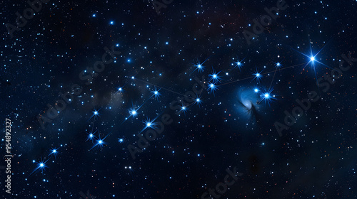 The constellation of Delphinus swimming in a starry sky. photo