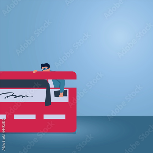 A man takes the CVV from a credit card, illustration of credit card fraud.