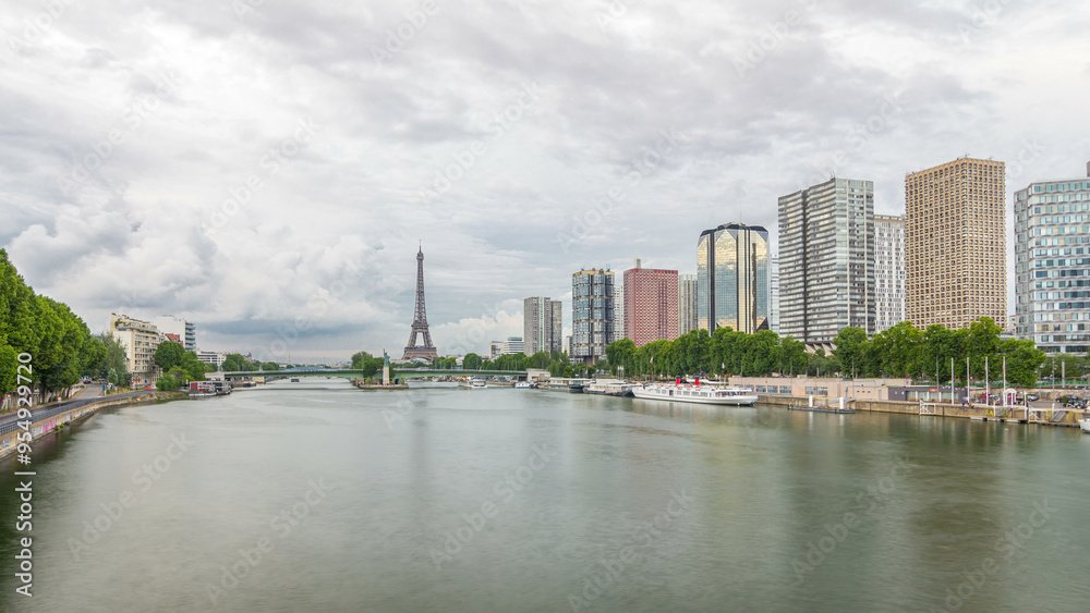 Naklejka premium The Statue of Liberty and the Eiffel Tower timelapse hyperlapse with modern buildings. Paris, France