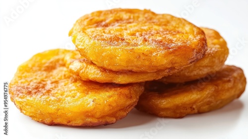 A Stack of Four Golden Brown Fried Pumpkin Fritters