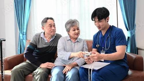 Senior couple get medical service visit from male caregiver nurse at home while having result of medical exam from pulse oximeter for health care and pension welfare insurance