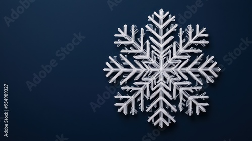 Beautifully detailed snowflake against a dark background, perfect for winter-themed designs and seasonal decorations.