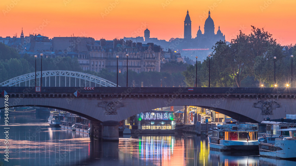 Naklejka premium Bridge near Eiffel tower and the Seine river night to day transition timelapse before sunrise, Paris, France.