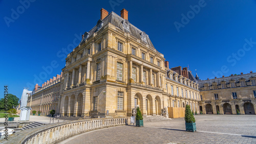 Beautiful Medieval landmark - royal hunting castle Fontainbleau timelapse hyperlapse. photo