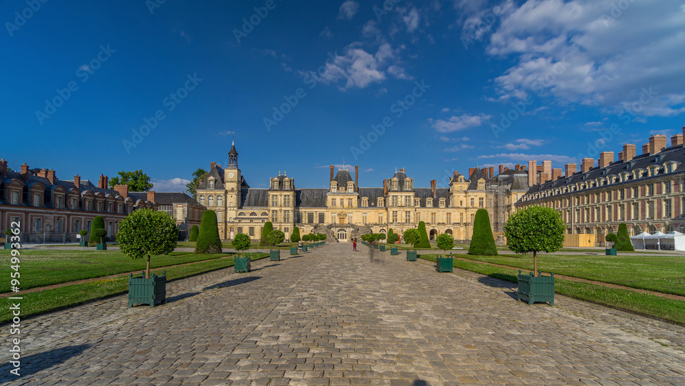 Obraz premium Beautiful Medieval landmark - royal hunting castle Fontainbleau timelapse hyperlapse.