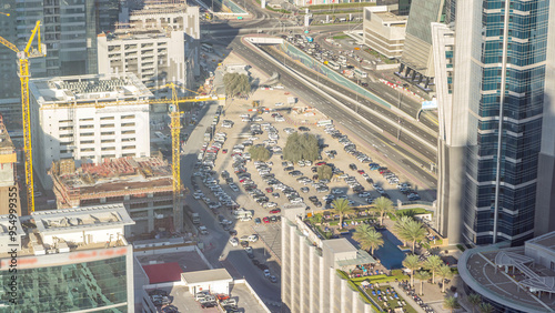 Aerial view of traffic on Business Bay with parking timelapse. photo