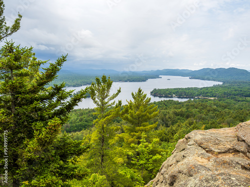 Fourth Lake disappearing in the distant wilderness seen from the summit on the Rocky Mountain hiking trail in Adirondacks, New York. photo