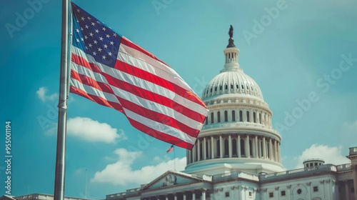 A large American flag is flying outside the United States Capitol building
