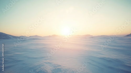 A stunning sunrise casts a warm glow over the vast, snow-covered Arctic landscape, highlighting the tranquility of winter