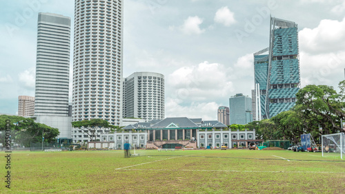 Skyline with Singapore Recreation Club and skyscrapers on background timelapse hyperlapse photo