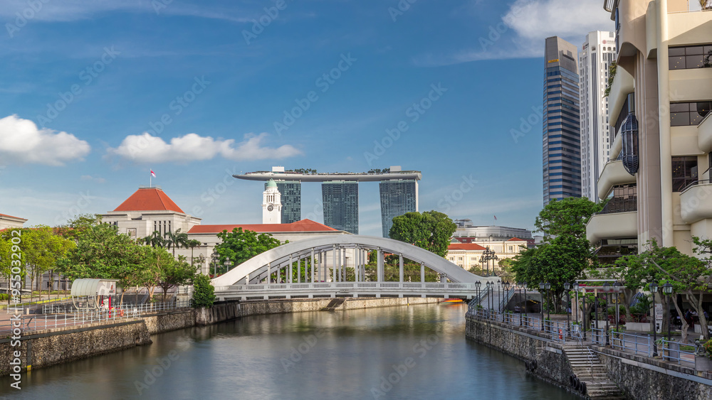 Skyline of Singapore financial district behind Elgin Bridge and the Singapore River timelapse hyperlapse Skyline of Singapore financial district behind Elgin Bridge and the Singapore River timelapse hyperlapse