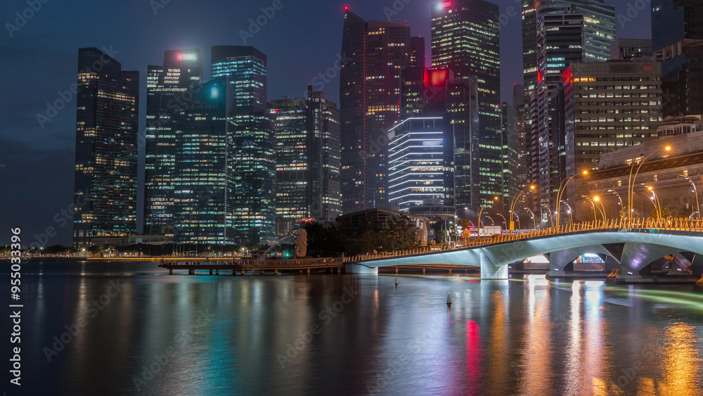 Esplanade bridge and downtown core skyscrapers in the background Singapore night to day timelapse Esplanade bridge and downtown core skyscrapers in the background Singapore night to day timelapse