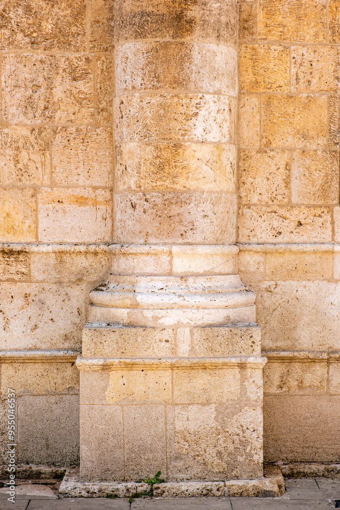 Column detail on the wall of the historic building. Historical monument built in Baroque style. Architectural detail background. Column detail on the wall of the historic building. Historical monument built in Baroque style. Architectural detail background.