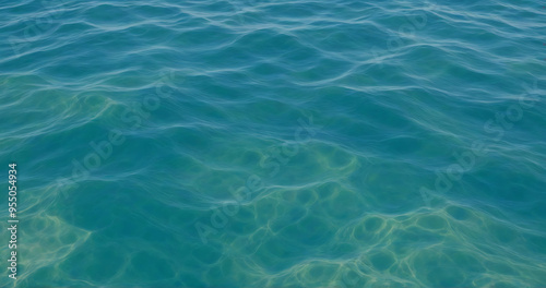 Tranquil Water Surface: Rippling Blue and Green Waves Capturing Natural Serenity and Fluidity