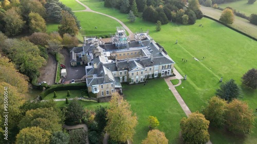 Polesden Lacey national trust Edwardian house and estate country house travel tourism vacation holiday destination downward panning aerial autumn photo