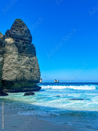 Ocean wave crashing into the high rock at Diamond Beach - Nusa Penida, Bali, Indonesia