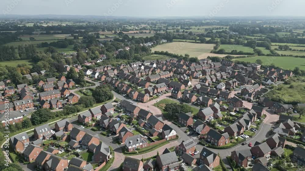 Aerial view of a new housing estate in farmland on the outskirts of Nantwich, Cheshire, England Aerial view of a new housing estate in farmland on the outskirts of Nantwich, Cheshire, England