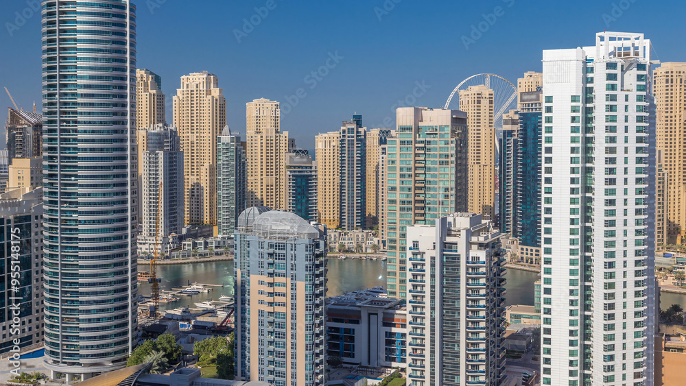 Dubai Marina skyscrapers aerial top view at morning from JLT in Dubai timelapse, UAE. Dubai Marina skyscrapers aerial top view at morning from JLT in Dubai timelapse, UAE.
