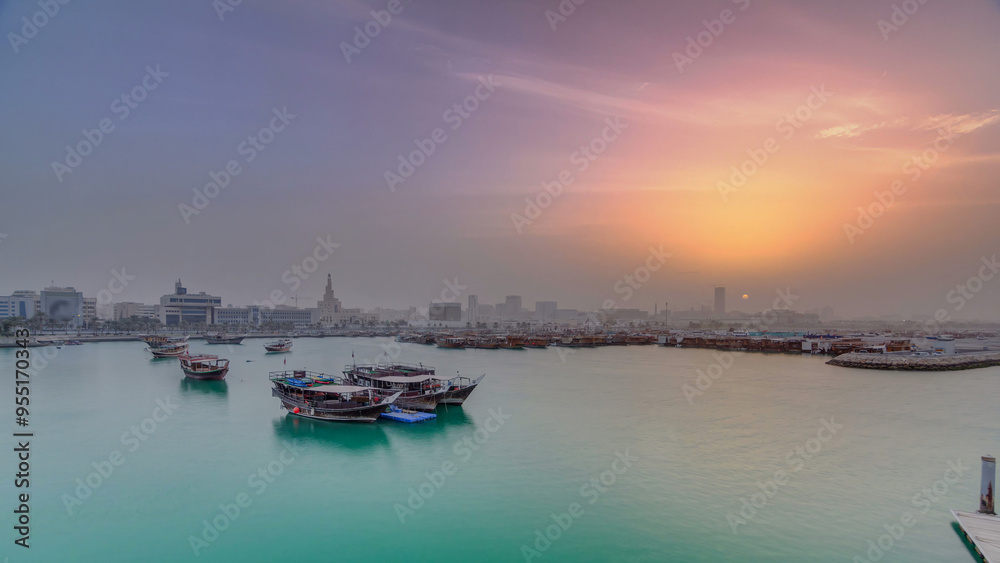 Sunset at Doha Bay timelapse with Traditional Wooden Dhow Fishing Boats. Sunset at Doha Bay timelapse with Traditional Wooden Dhow Fishing Boats.