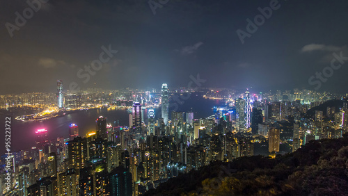 Wallpaper Mural Hong Kong city skyline aerial timelapse at night with Victoria Harbor and skyscrapers Torontodigital.ca