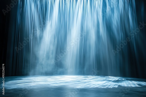 A stunning display of soft blue light cascading in beams, creating a serene and tranquil atmosphere.