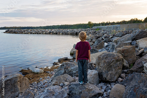 Family, visiting small village Lorudden in Sweden, summertime. Scandinavian coast photo