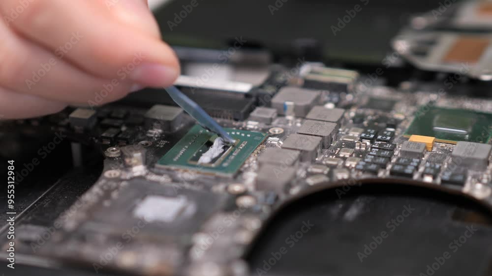 close-up applying thermal paste to computer processor chip. Computer service close-up applying thermal paste to computer processor chip. Computer service