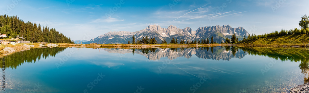 High resolution stitched alpine summer panorama with reflections and Mount Wilder Kaiser at Mount Astberg, Going, Kitzbuehel, Tyrol, Austria High resolution stitched alpine summer panorama with reflections and Mount Wilder Kaiser at Mount Astberg, Going, Kitzbuehel, Tyrol, Austria