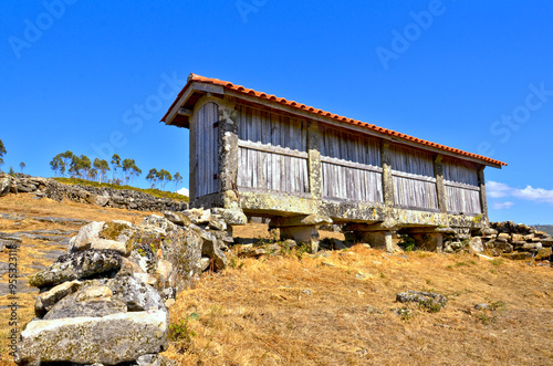 The granaries of the charming village of Porreiras, in Paredes de Coura, Portugal photo