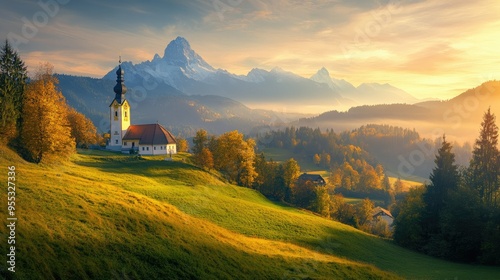 Picturesque Bavarian scenery with Maria Gern Church and Hochkalter Peak, bathed in the golden light of sunrise photo