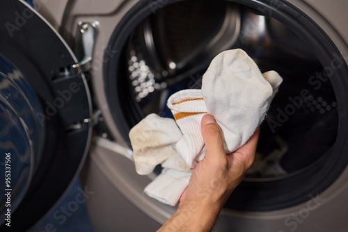 The Laundry Routine Properly Sorting Dark and Light Clothing for Effective Washing Process