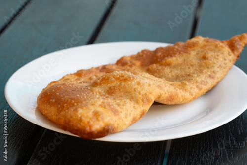 fried pies with meat - chebureks oriental cuisine