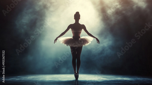 Plakat A silhouette of a ballerina in a classic ballet costume on stage, illuminated by a bright spotlight, creating a dramatic atmosphere