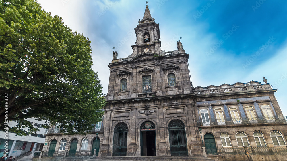 Fototapeta premium The Trinity Church timelapse hyperlapse in Porto, Portugal. Porto is one of the most popular tourist destinations in Europe.